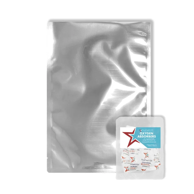 A quart flat Mylar bag beside a sealed pack of PackFreshUSA oxygen absorbers.